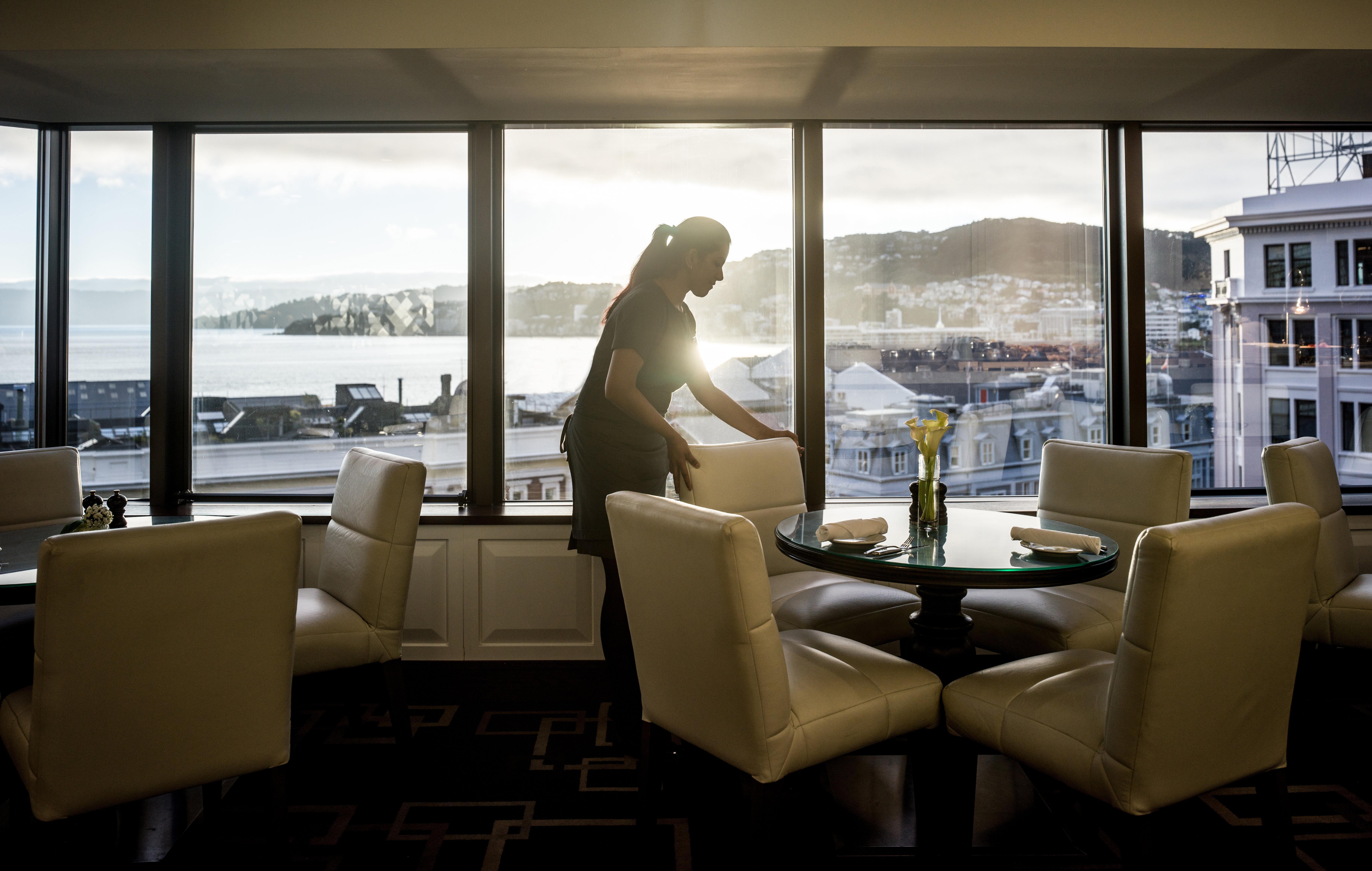 Intercontinental Wellington By Ihg Exterior foto A hotel maid polishing a chair